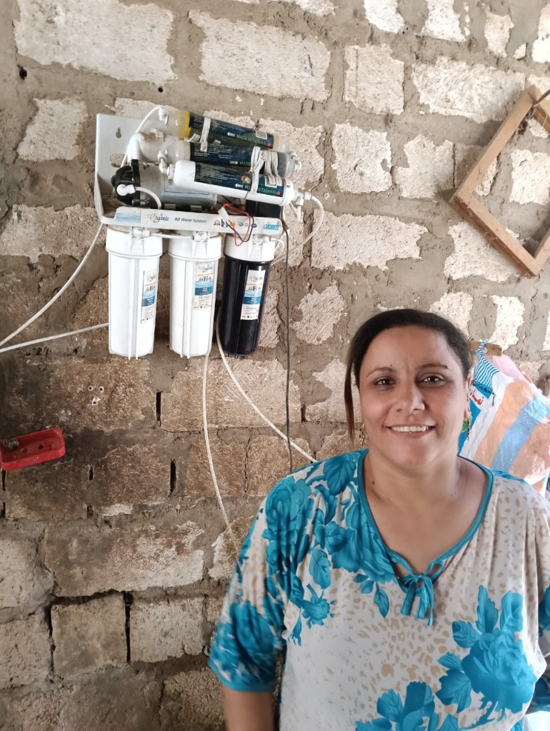 Local mother showing her newly installed filter system