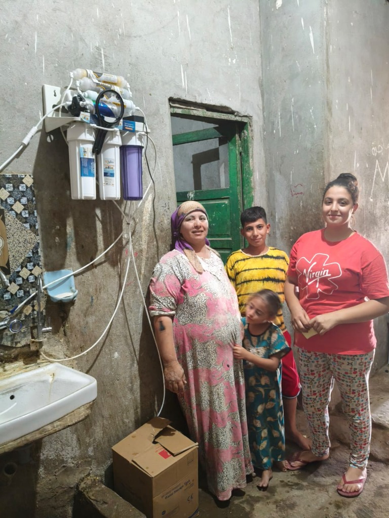 A local family with their filter installation